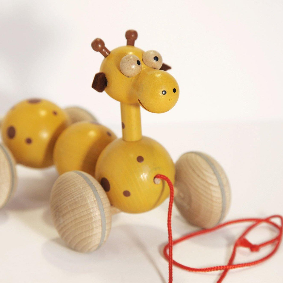 Wooden Giraffe Pull Along made by U+Me